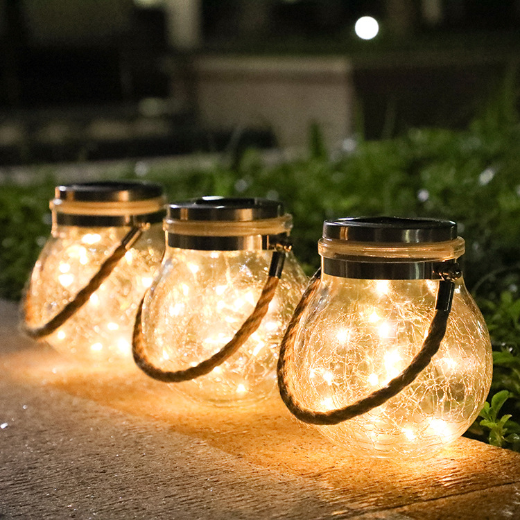 Norvo | Solenergi LED-lanterne i glass – Dekorativ hagebelysning med ledninger og bærehåndtak
