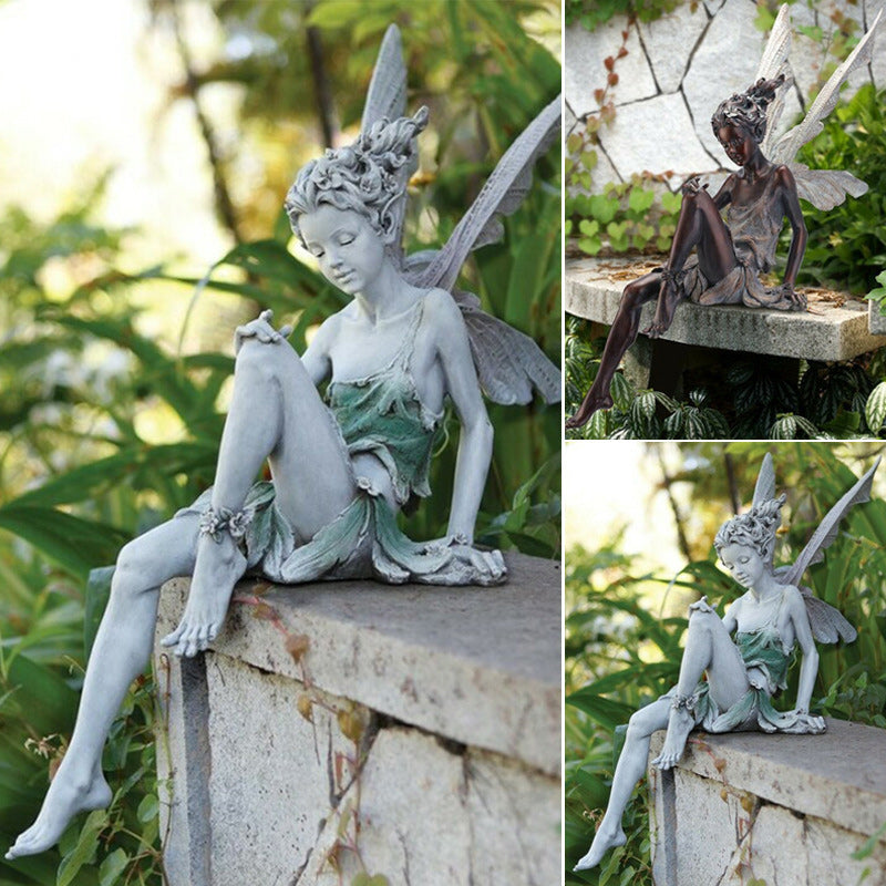 Norvo | Statue av sittende fe i hagen