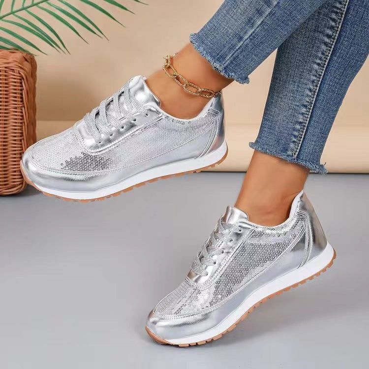 Dames fashionable sneakers med skimrende overmateriale og skli-resistent såle Norvo