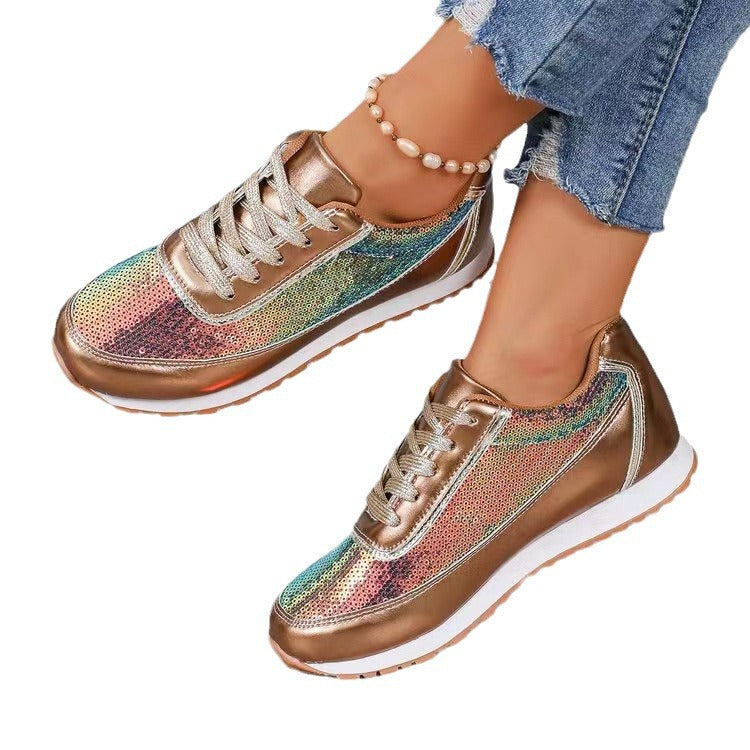 Dames fashionable sneakers med skimrende overmateriale og skli-resistent såle Norvo