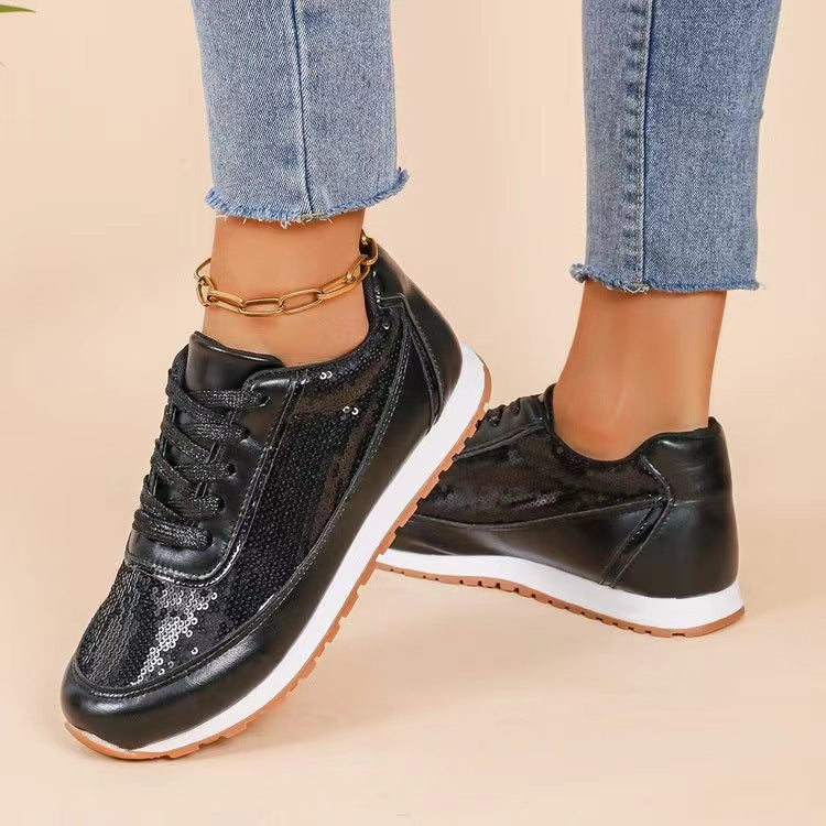 Dames fashionable sneakers med skimrende overmateriale og skli-resistent såle Norvo