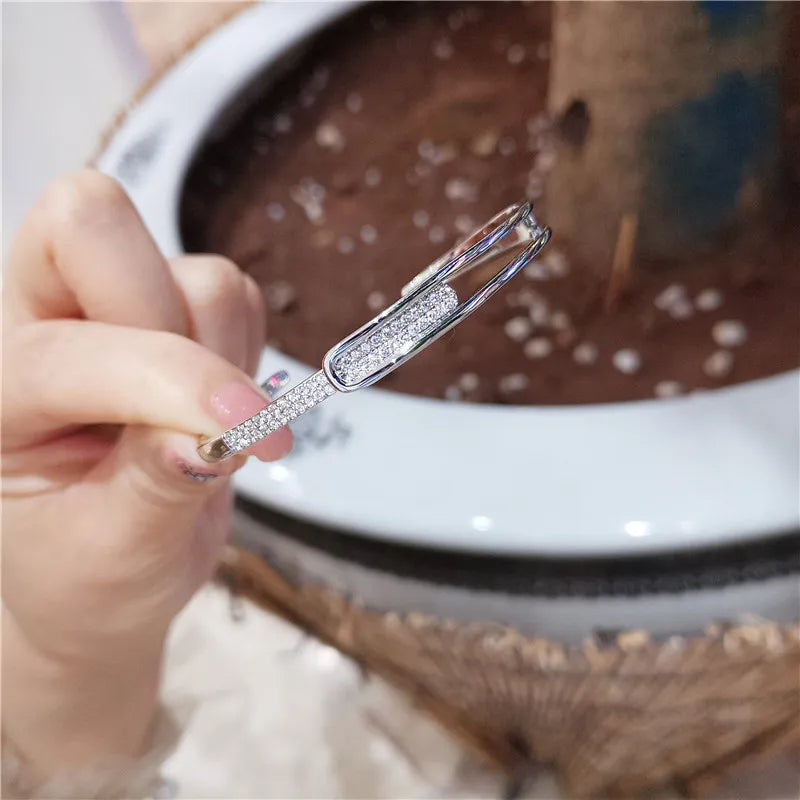 Norvo | Åpen armbånd laget av 925 sterling sølv med zirkonia