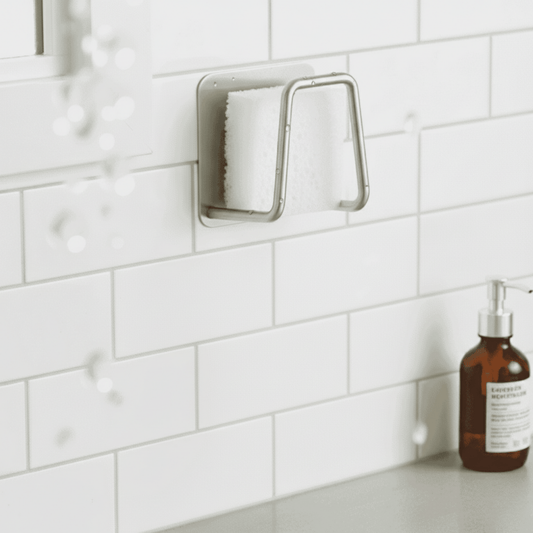 Norvo | Plassbesparende rustfritt stålsvampholder for vasker