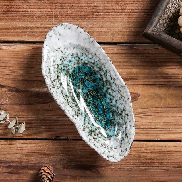 Norvo | Shellora – Elegant skallformet keramisk servise for stilfull dining
