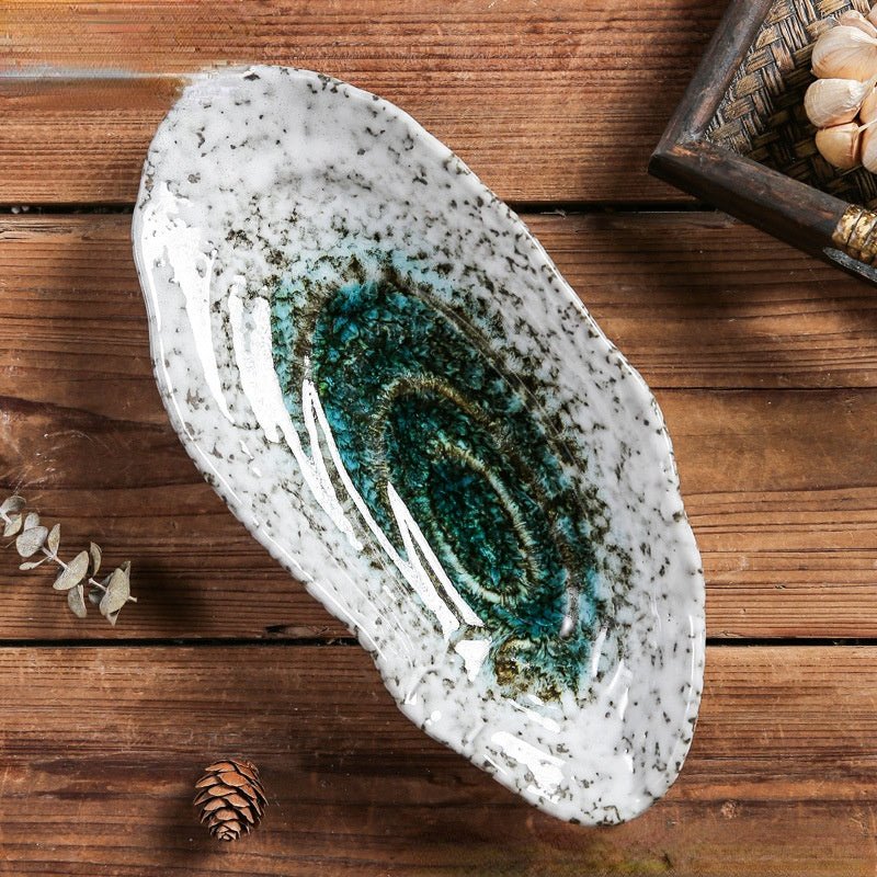 Norvo | Shellora – Elegant skallformet keramisk servise for stilfull dining