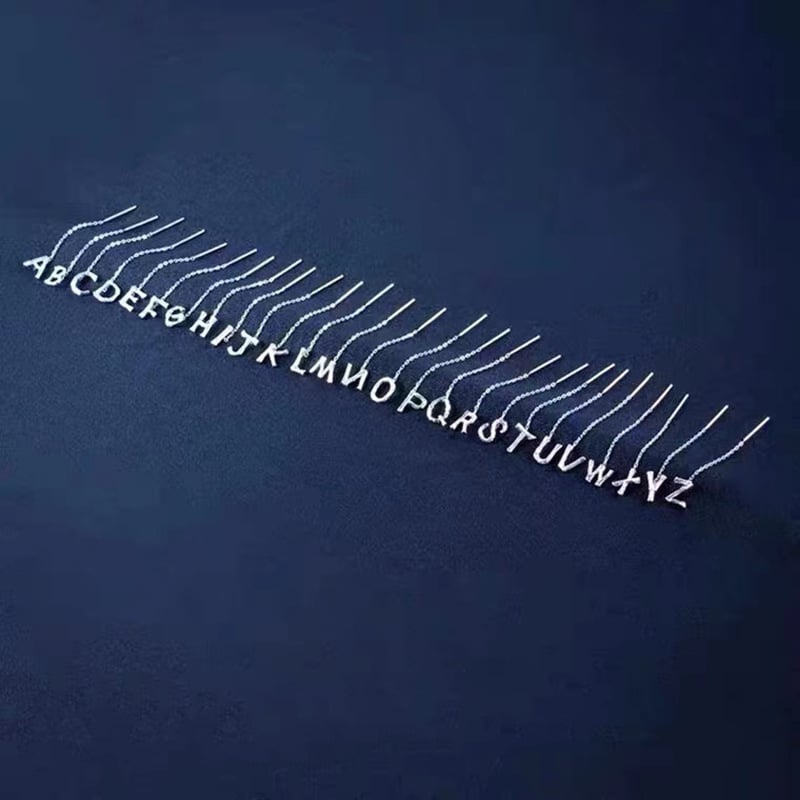 Norvo | Skinner alfabet øreringer