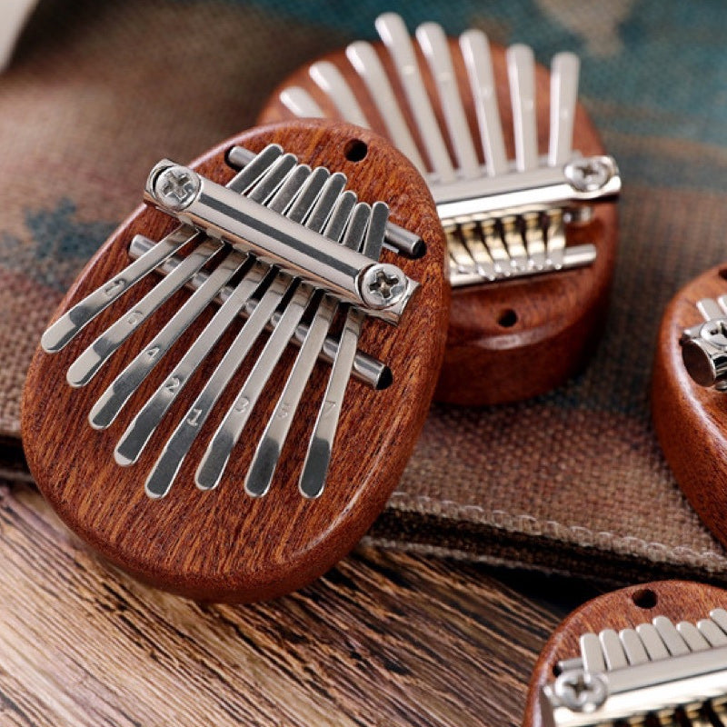 Norvo | Bærbar tommel piano