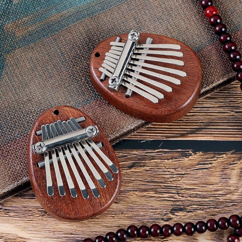 Norvo | Bærbar tommel piano