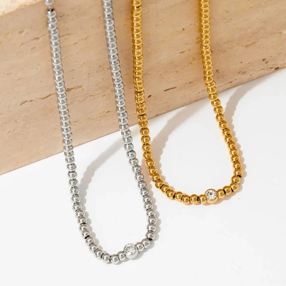 Norvo | 18k Perlede Diamant Senter Halssmykke og Armbånd