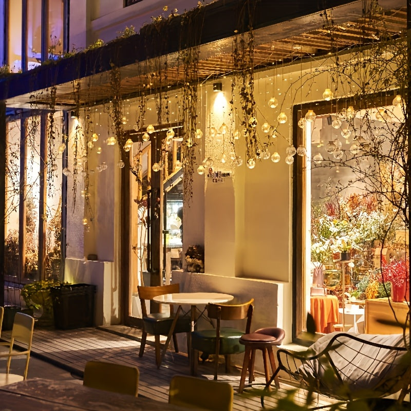 Norvo | Eventyrlys med hengende globusornamenter