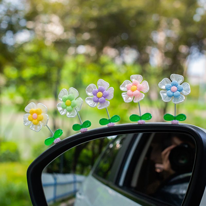 Norvo | Blomsterornamenter i bilen