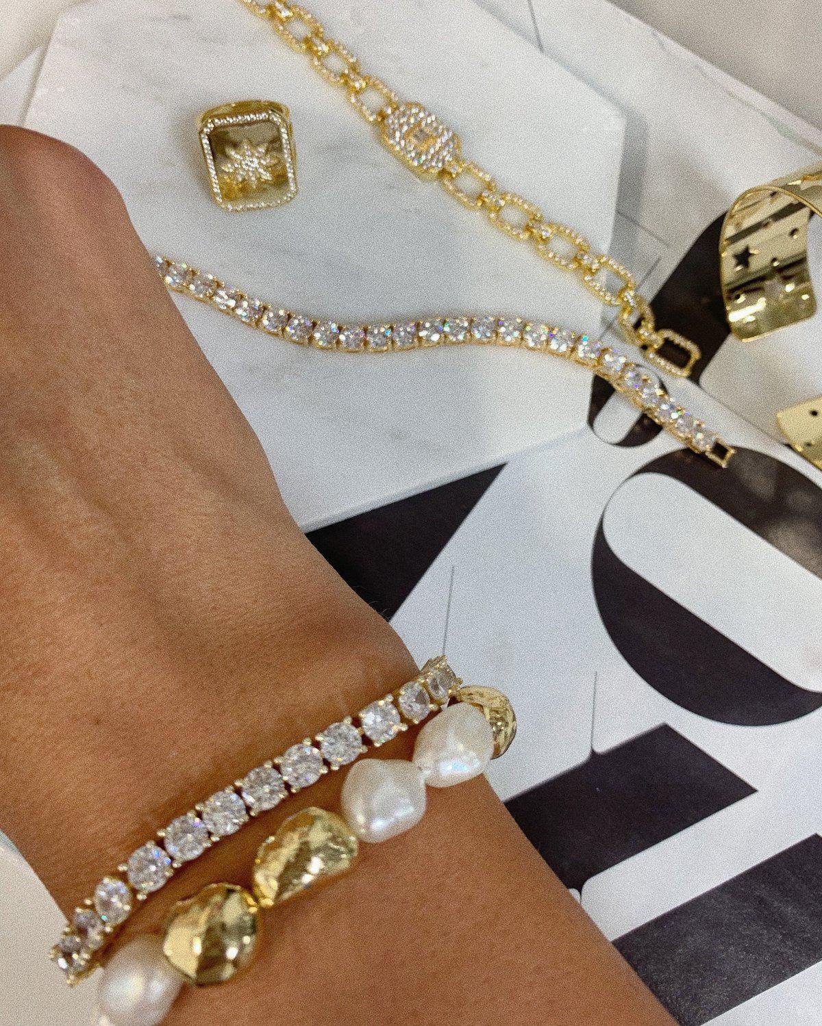 Norvo | DazzleCharm Tidøs Glitrende Stil