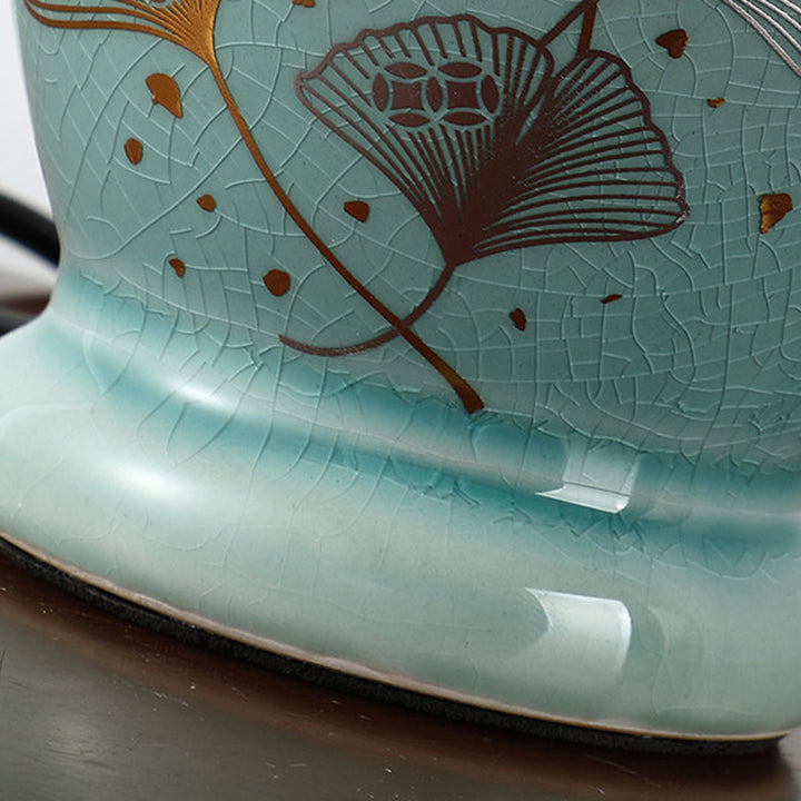 Norvo | Tradisjonelt kinesisk blomsterdesign rund vifte stoff keramikk 1-lys bordlampe til stuen