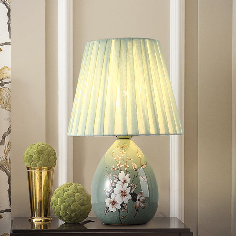 Norvo | Tradisjonelt kinesisk blomsterdesign rund vifte stoff keramikk 1-lys bordlampe til stuen