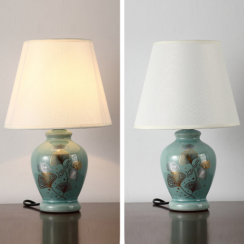 Norvo | Tradisjonelt kinesisk blomsterdesign rund vifte stoff keramikk 1-lys bordlampe til stuen