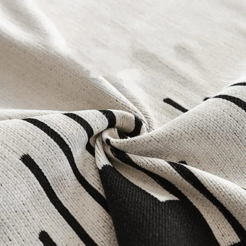 Norvo | Elegant svart og hvitt sofa dekke beskytter