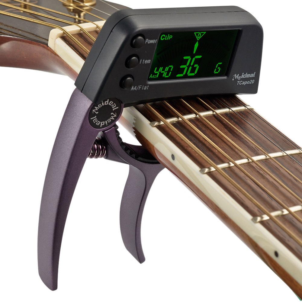 Norvo | Capo & Tuner "TuneGrip" – 2-i-1 gitar tilbehør med LCD-skjerm