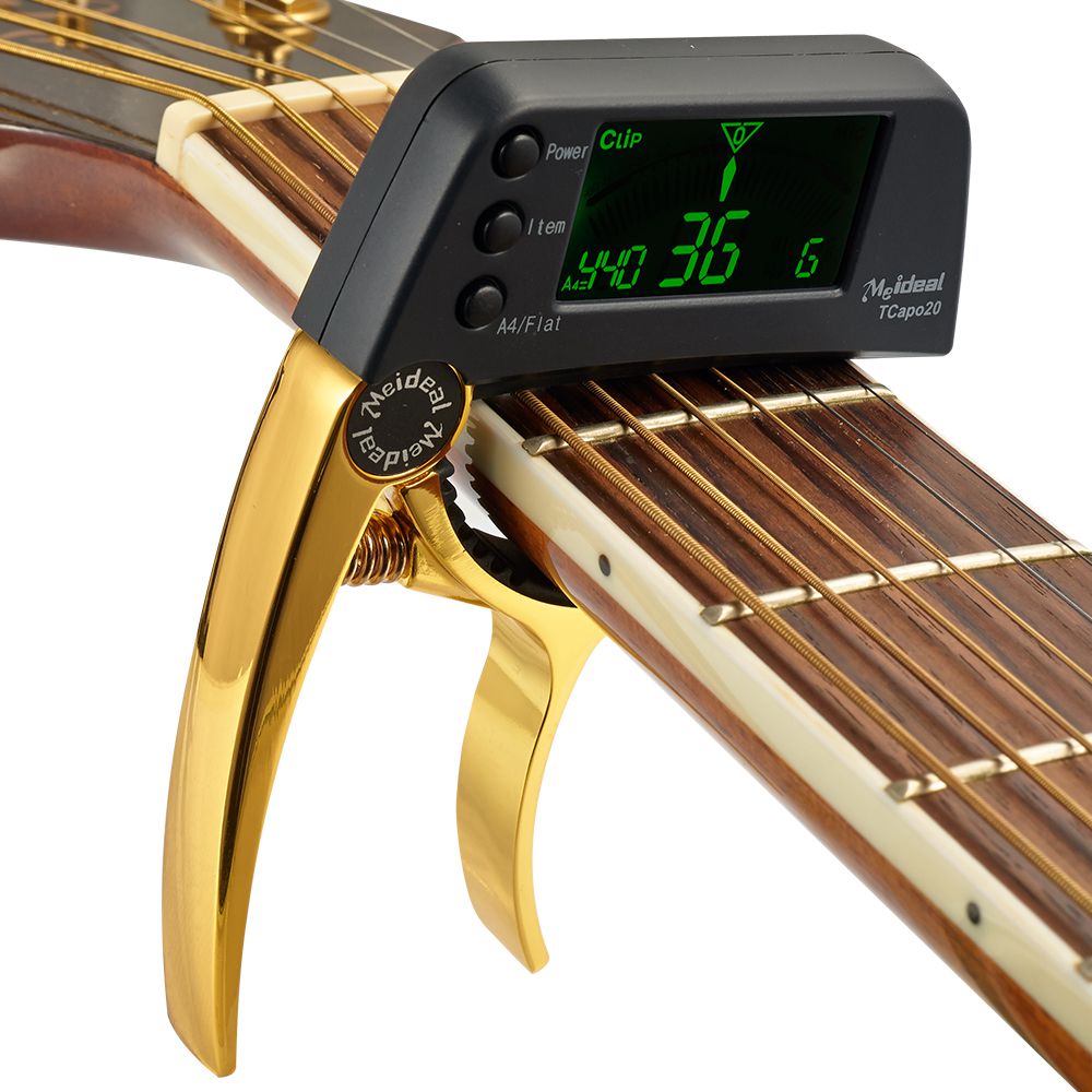 Norvo | Capo & Tuner "TuneGrip" – 2-i-1 gitar tilbehør med LCD-skjerm