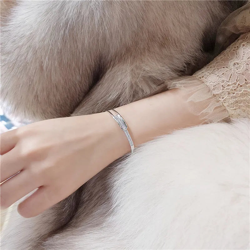 Norvo | Åpen armbånd laget av 925 sterling sølv med zirkonia