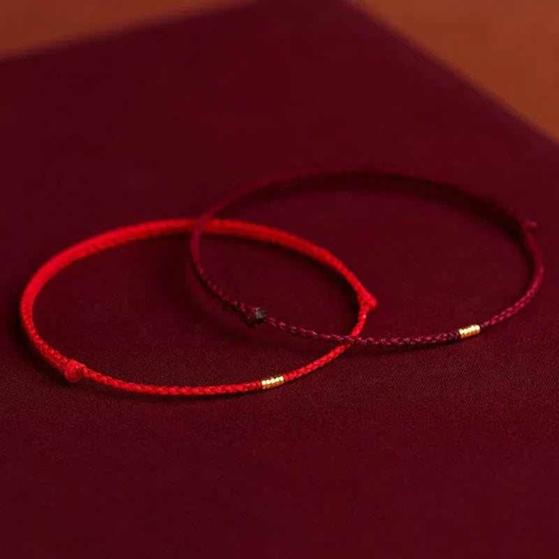 Håndlaget armbånd med hellig velsignelse