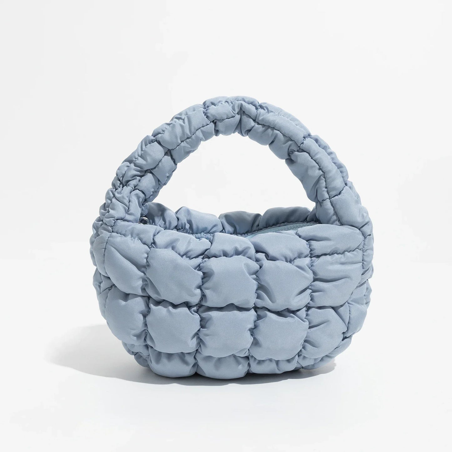 Norvo | Livlig quiltet rund mini bag