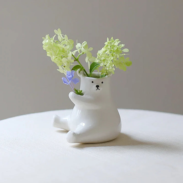 Bjørn med blomsterpotte | Norvo