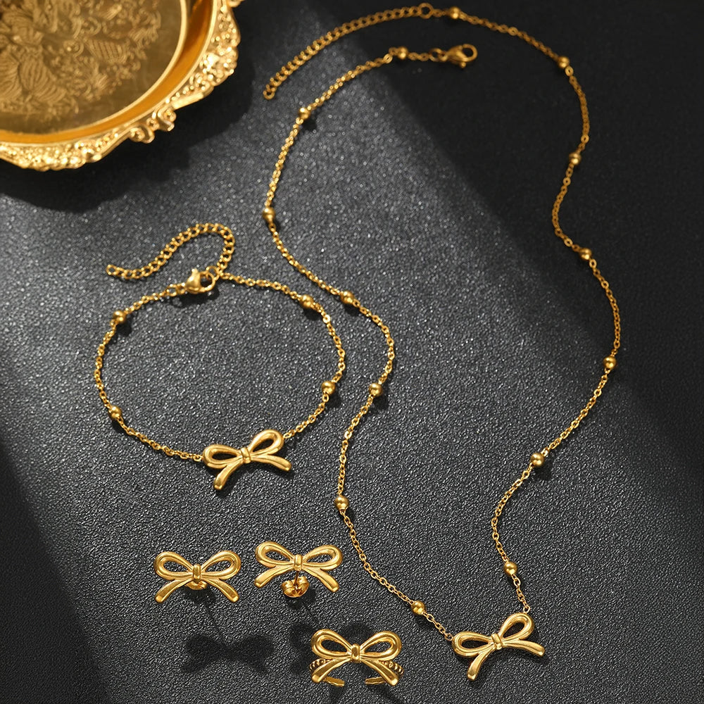 Norvo | Feminine Bow Satellite Chain Necklace, Bracelet, Earrings, and Ring Set