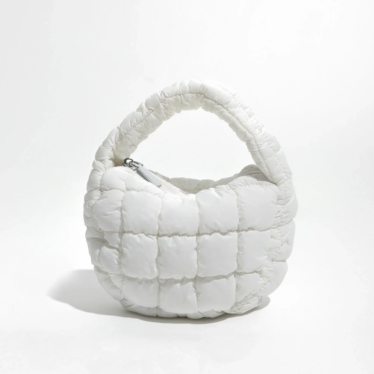 Norvo | Livlig quiltet rund mini bag