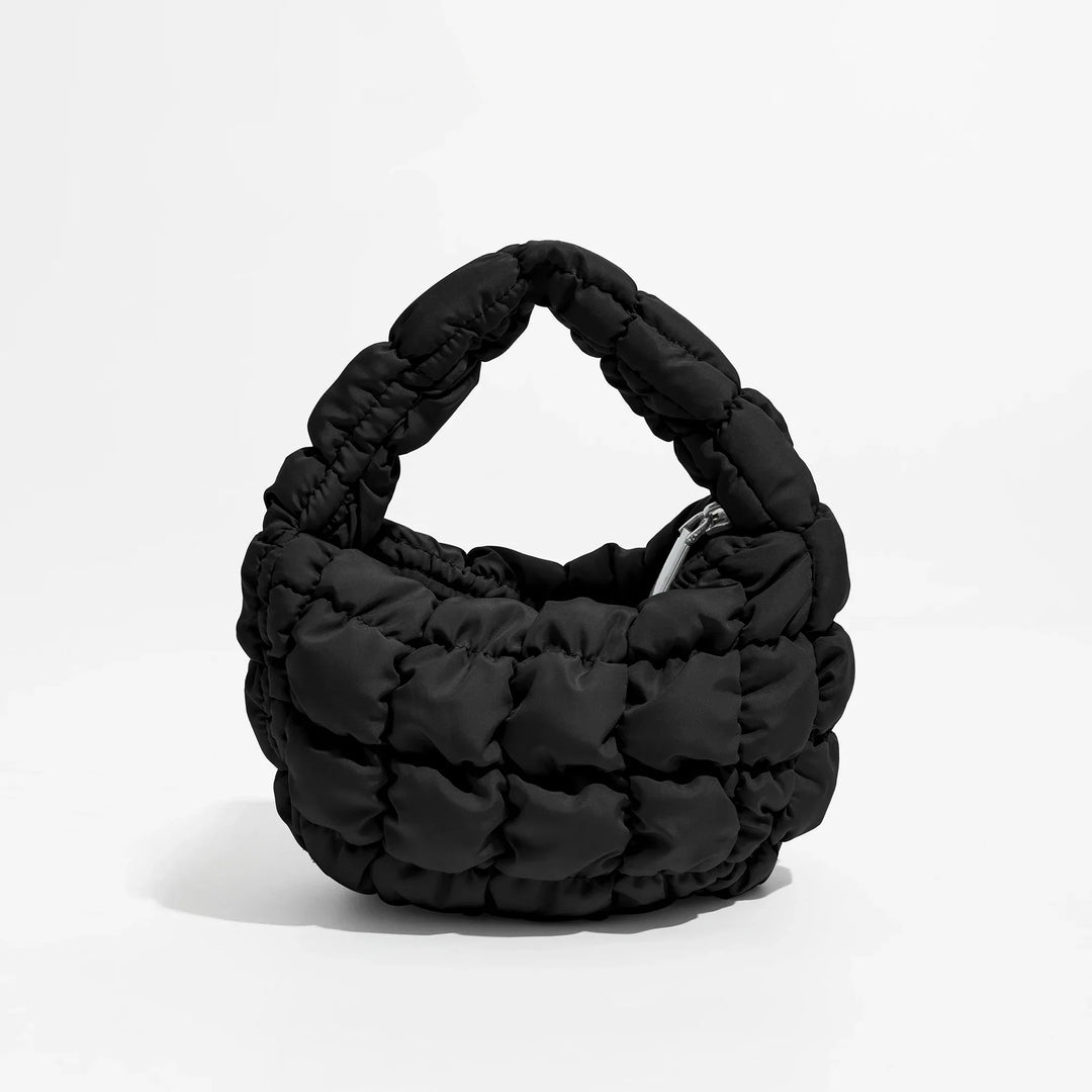 Norvo | Livlig quiltet rund mini bag