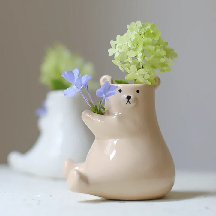 Bjørn med blomsterpotte | Norvo