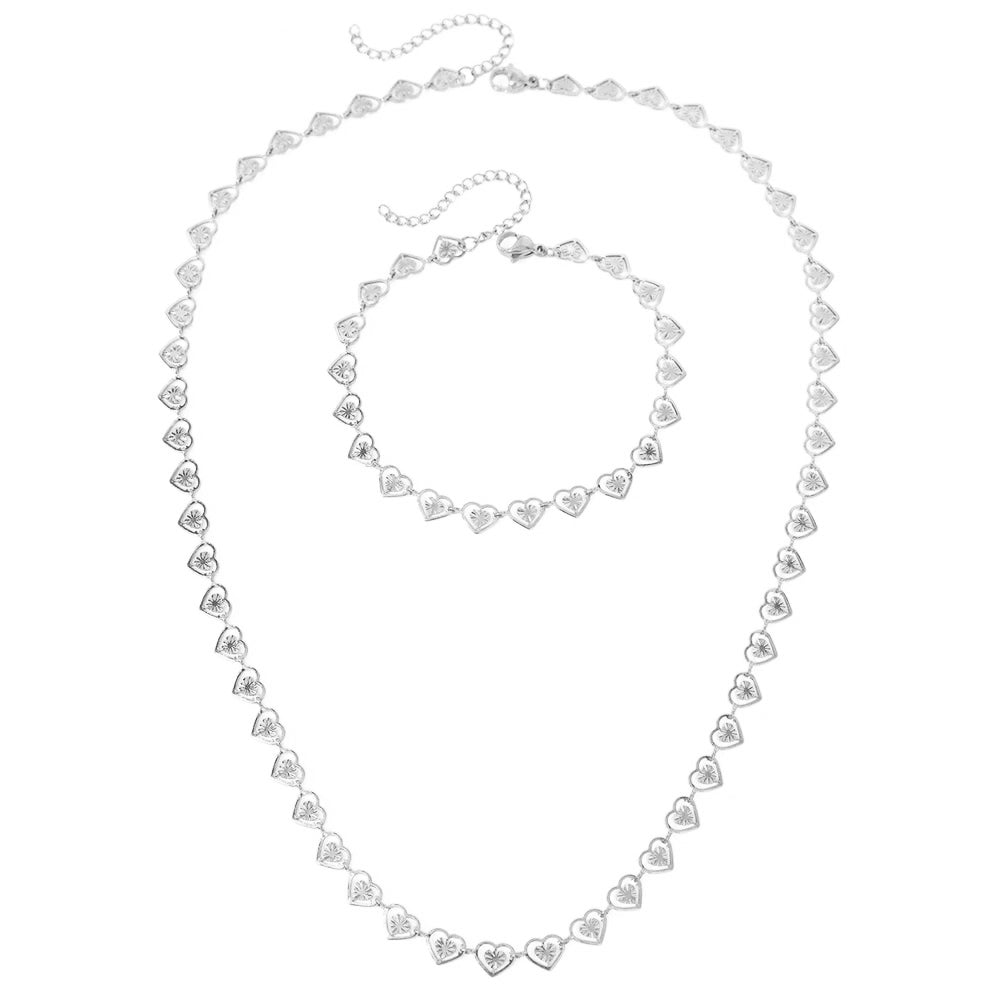 Norvo | Delikat Spiral Hjerter Armbånd og Kjede Sett