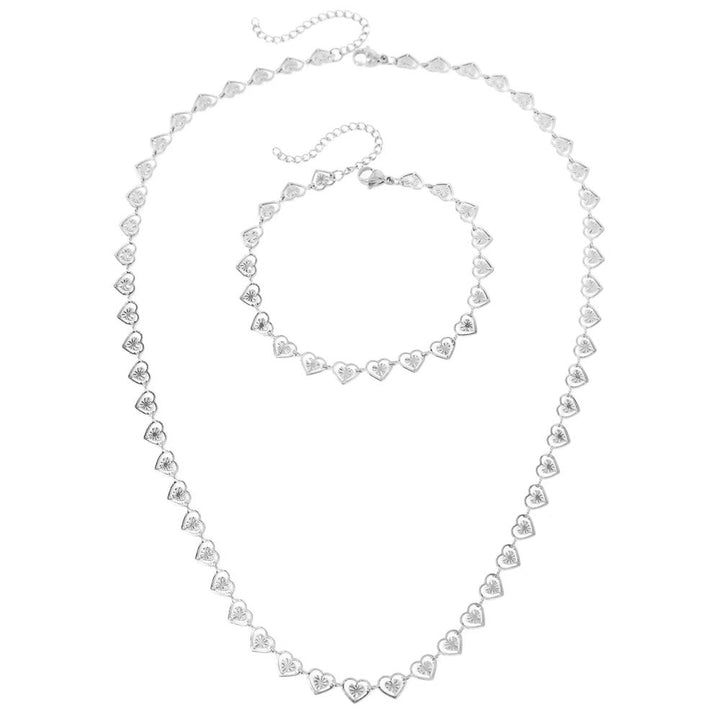 Norvo | Delikat Spiral Hjerter Armbånd og Kjede Sett