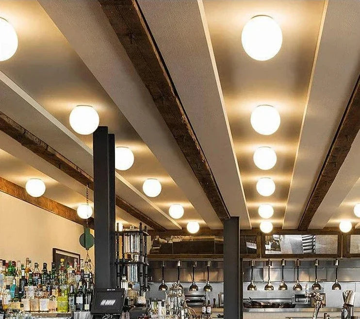 Norvo | GlaciaLuxe – Minimalist Vegglampe med Glass Stein Design