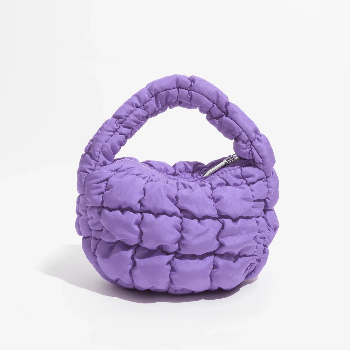 Norvo | Livlig quiltet rund mini bag