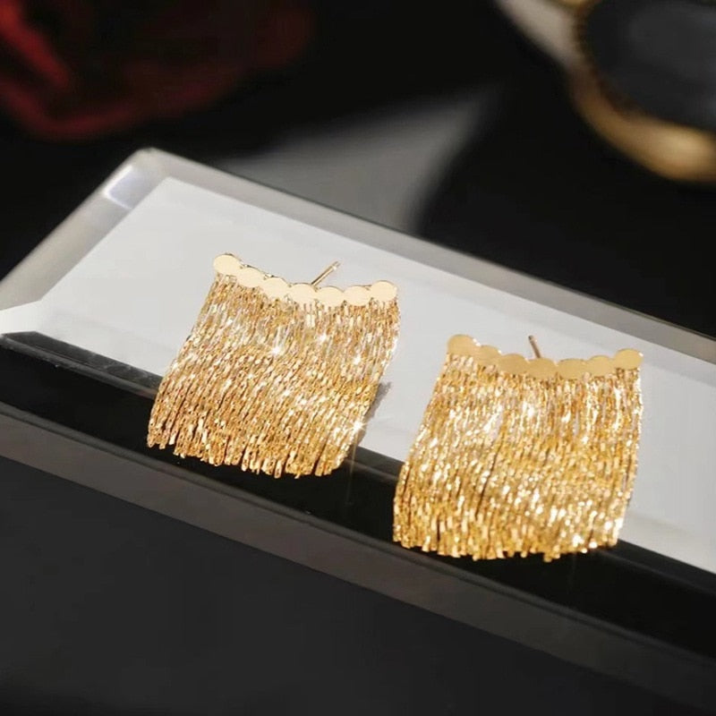 Norvo | Gylden Skinner By Frynse Øredobbe