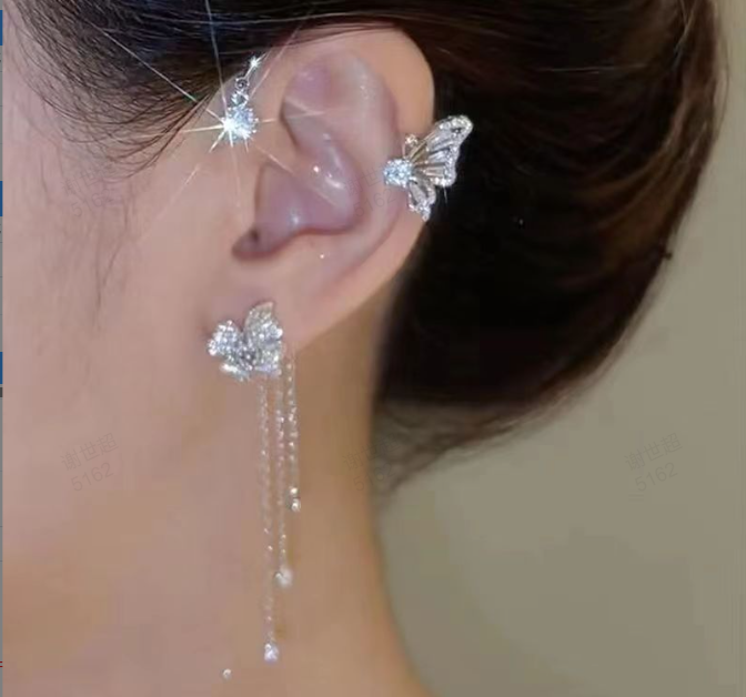 Norvo | Elegant uttalelsesøredobber med sommerfugldesign og glitrende zirconia