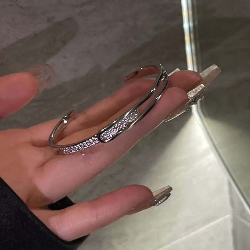 Norvo | Åpen armbånd laget av 925 sterling sølv med zirkonia