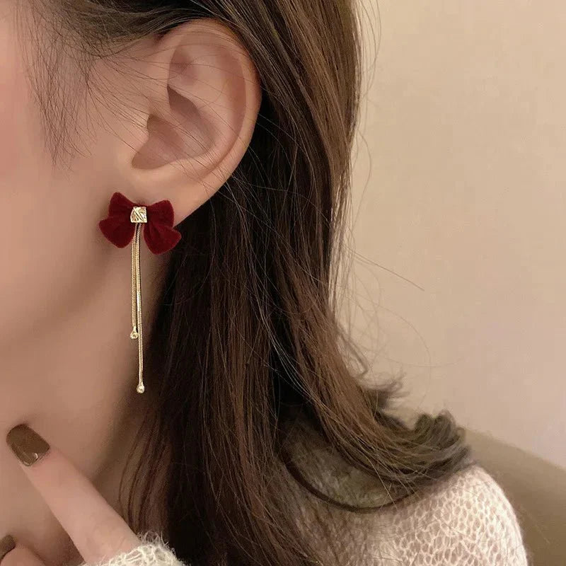 Norvo | Delikat Sløyfe Gull Dangle Øredobber