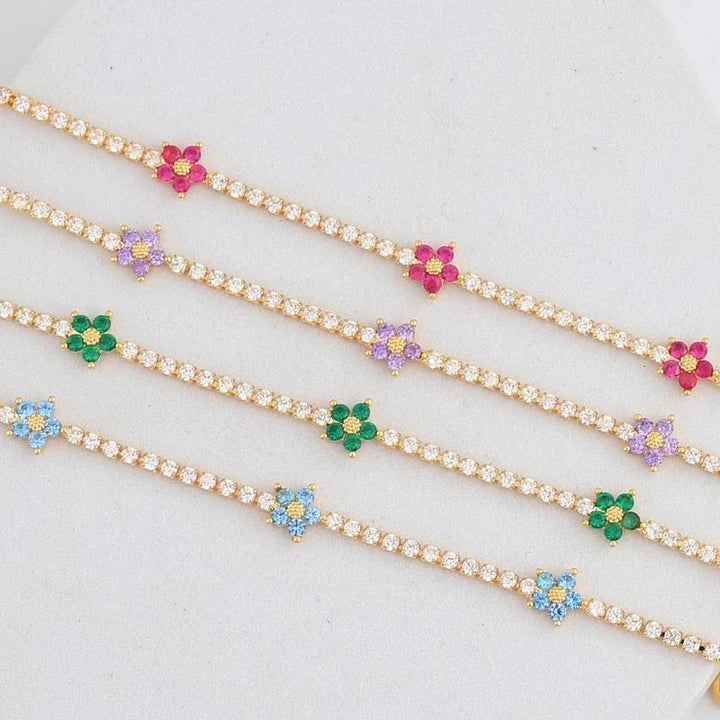 Norvo | Delikate diamantblomster armbånd og øredobber