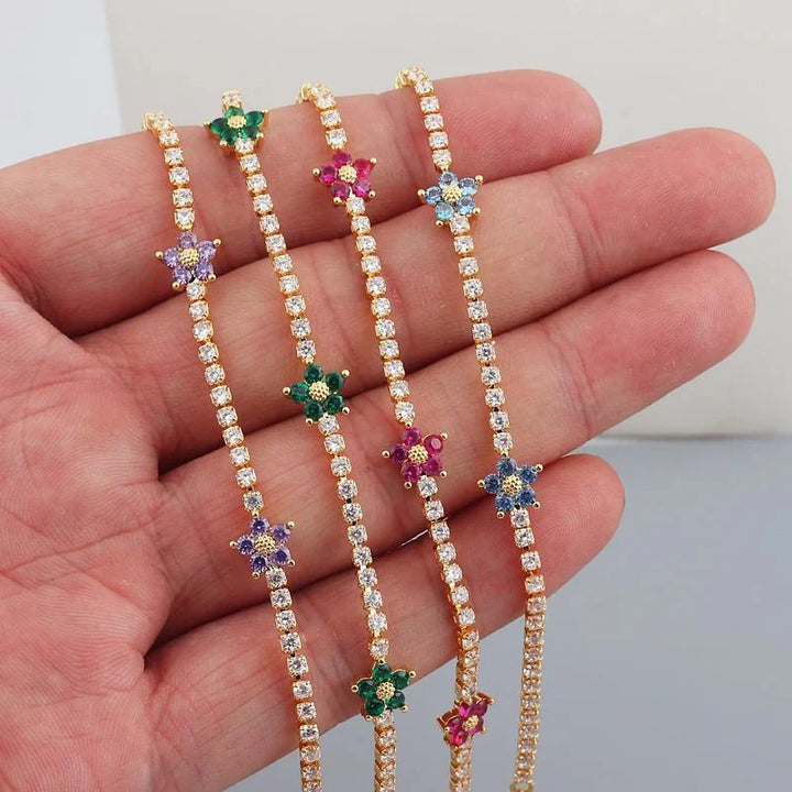 Norvo | Delikate diamantblomster armbånd og øredobber