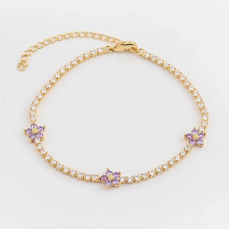 Norvo | Delikate diamantblomster armbånd og øredobber