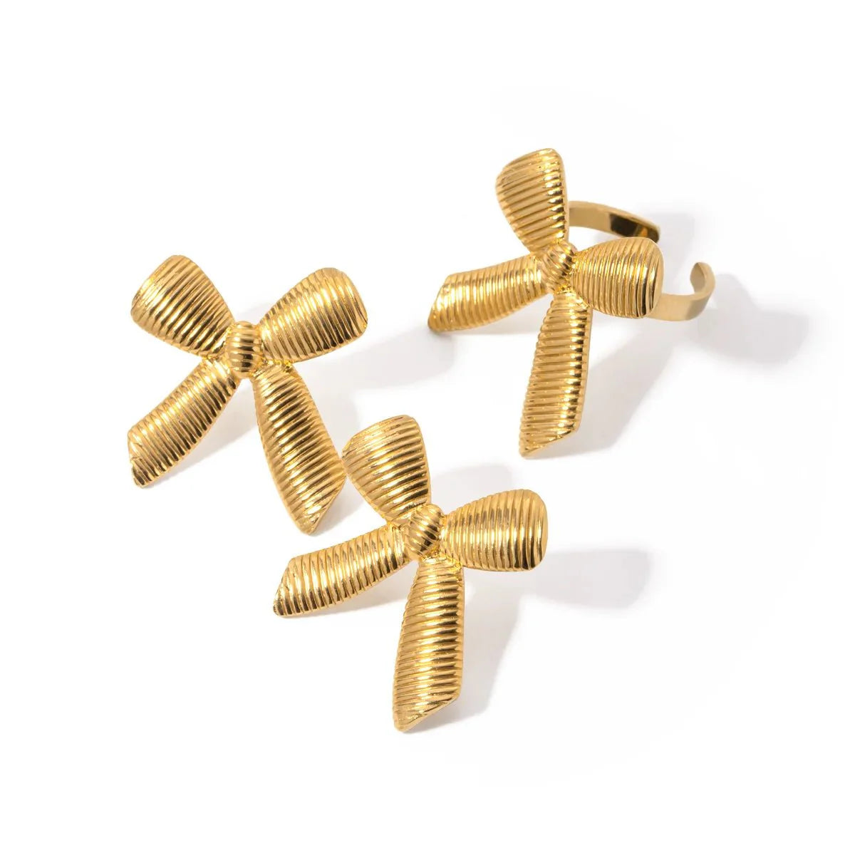 Norvo | Delikat Stripete Sløyfe Elegant Ring og Øredobber