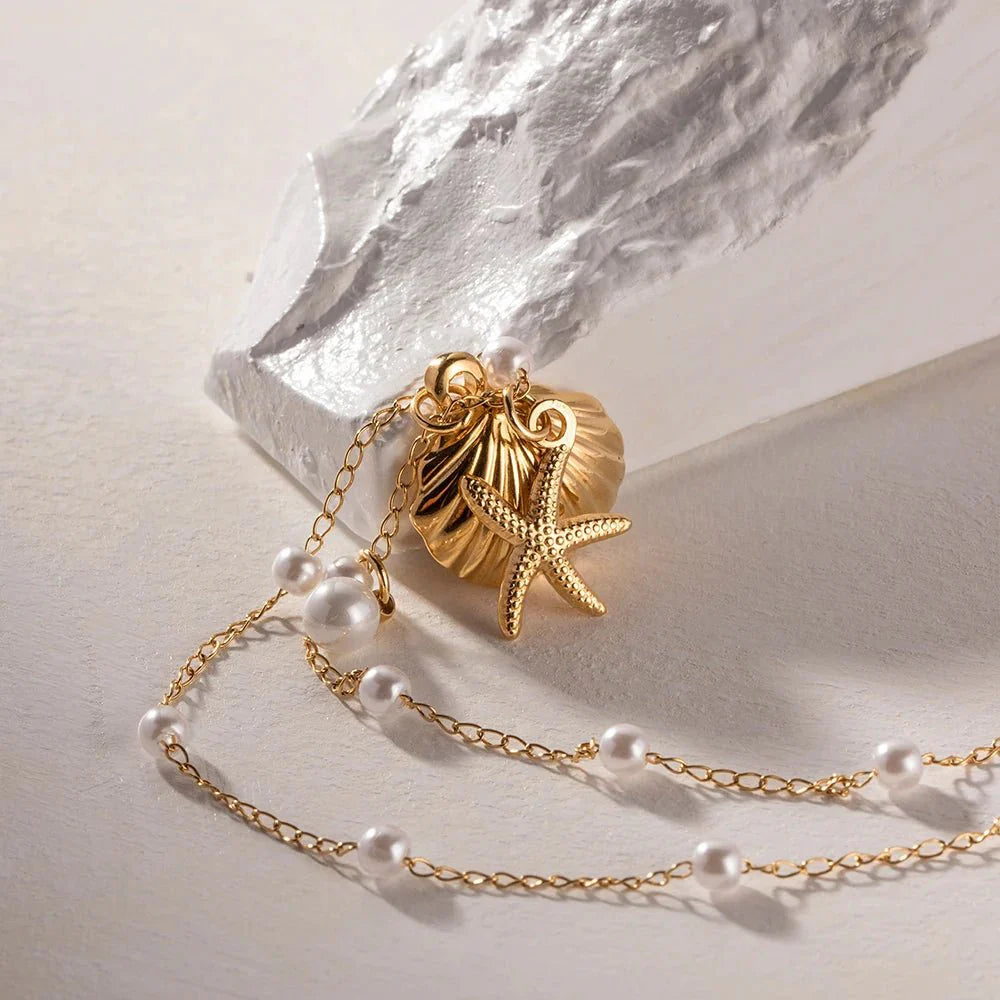 Norvo | Elegante Delikate Spaced Perle Musling Smykke