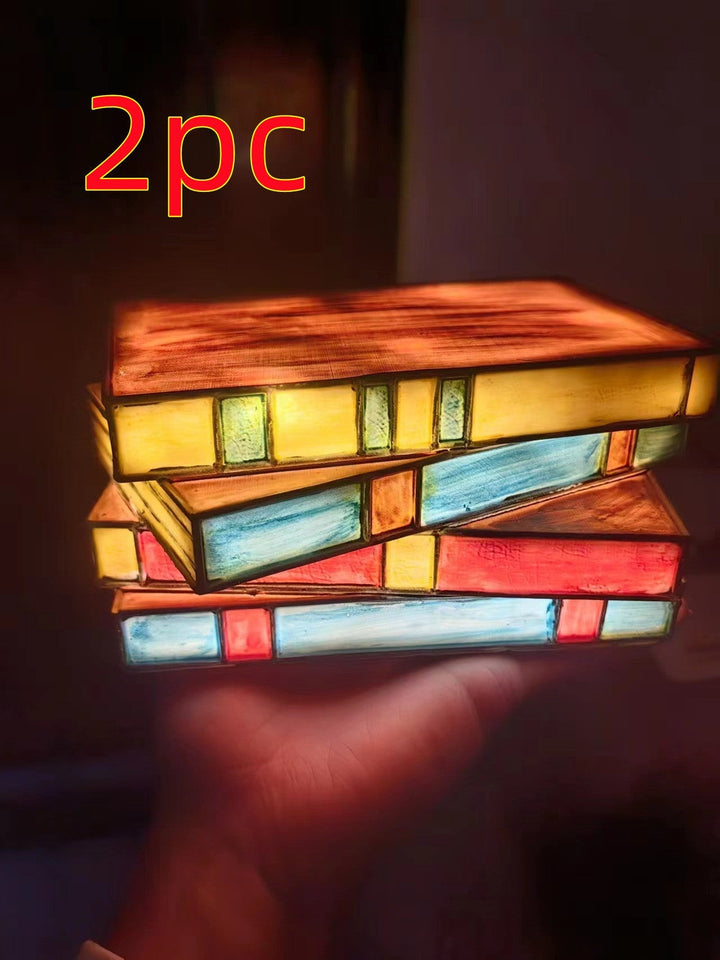 Norvo | Skrivebordslampe med stablede bøker