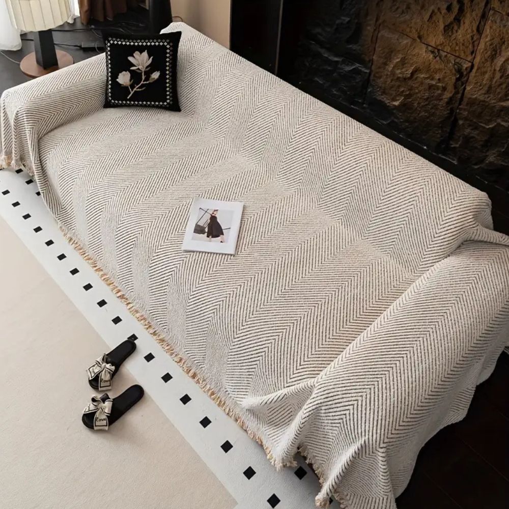 Norvo | CUSHVIVE – Herringbone Sofa Cover with Splash Protection and Non-Slip Design