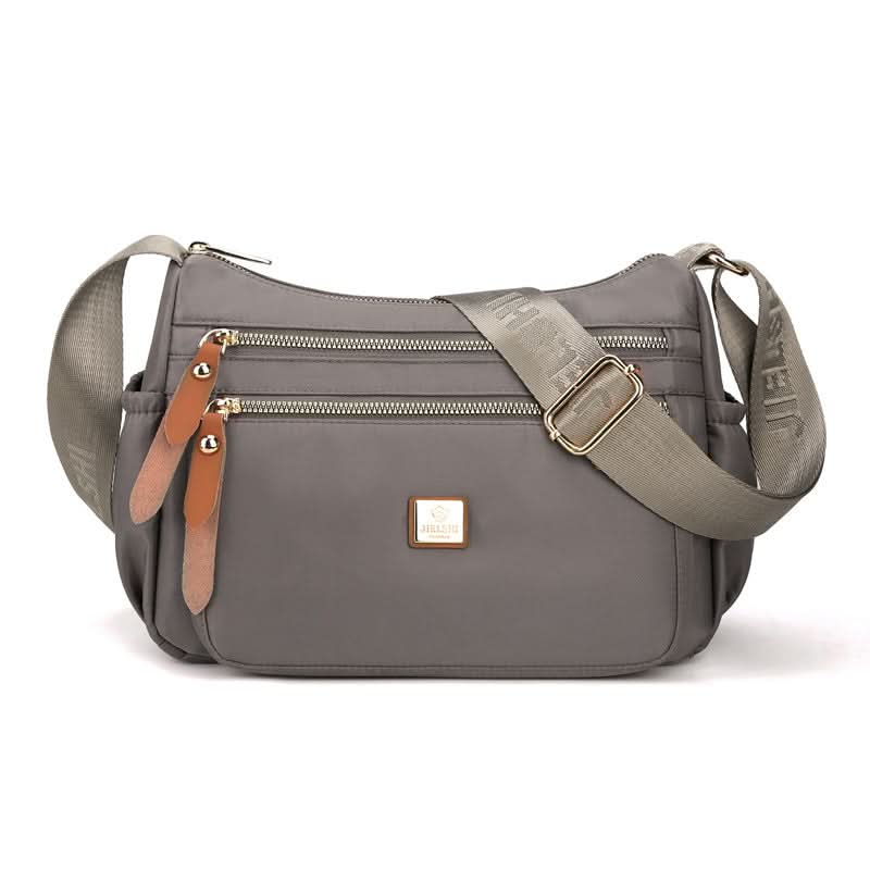 Norvo | Lettvekts nylon skulderveske med lommer