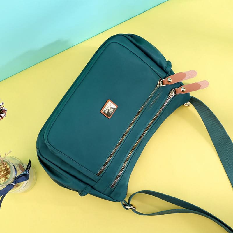 Norvo | Lettvekts nylon skulderveske med lommer