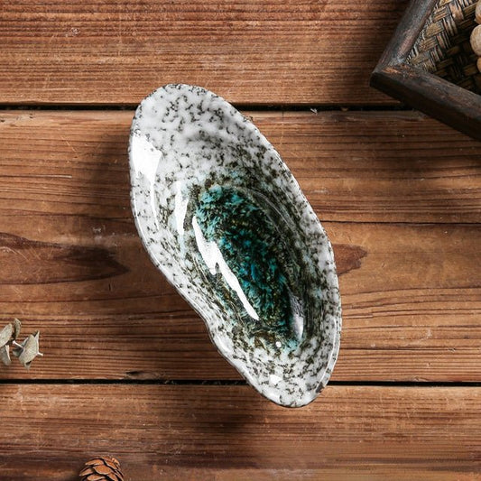 Norvo | Shellora – Elegant skallformet keramisk servise for stilfull dining